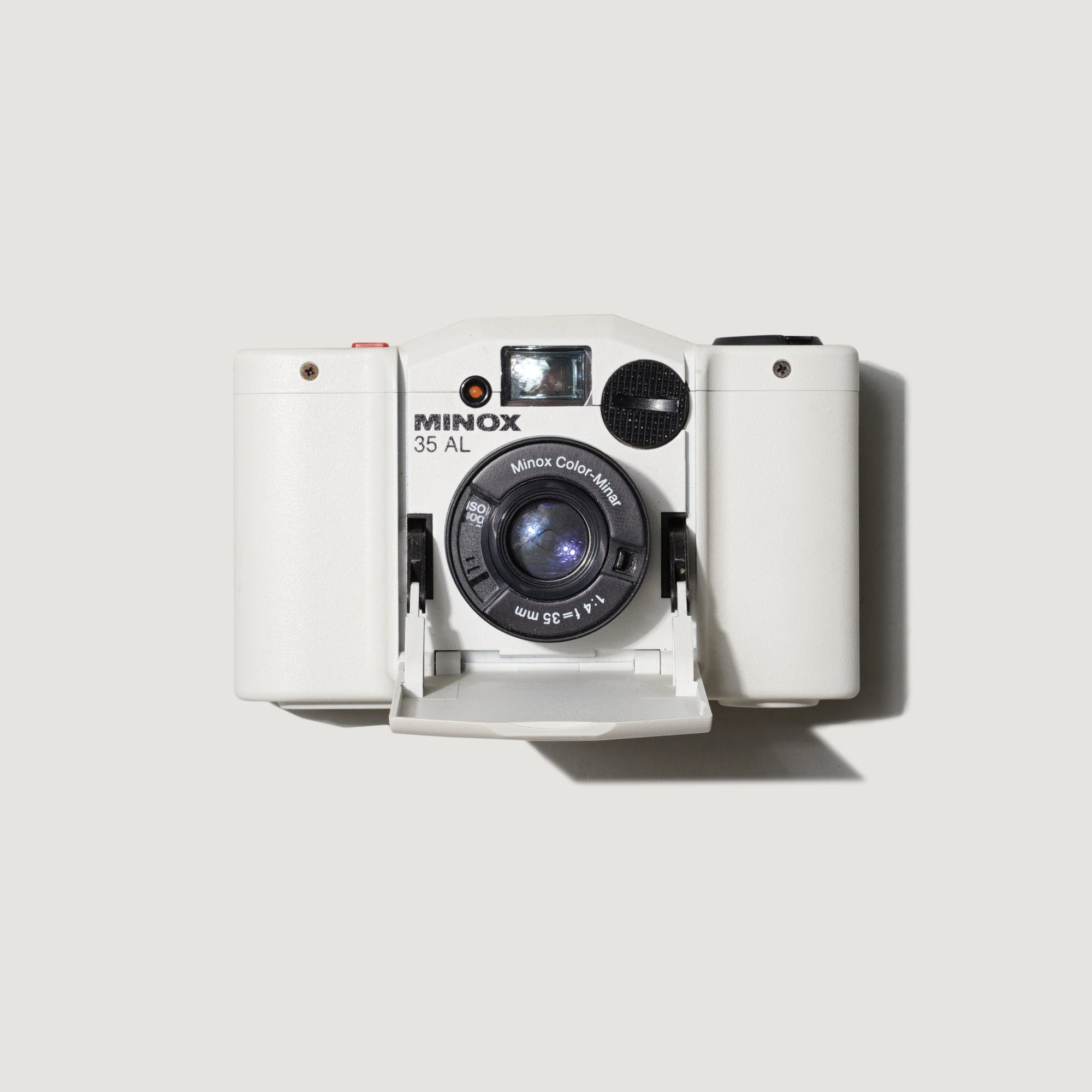 Close-up of Minox AL 35 compact film camera highlighting its sleek design