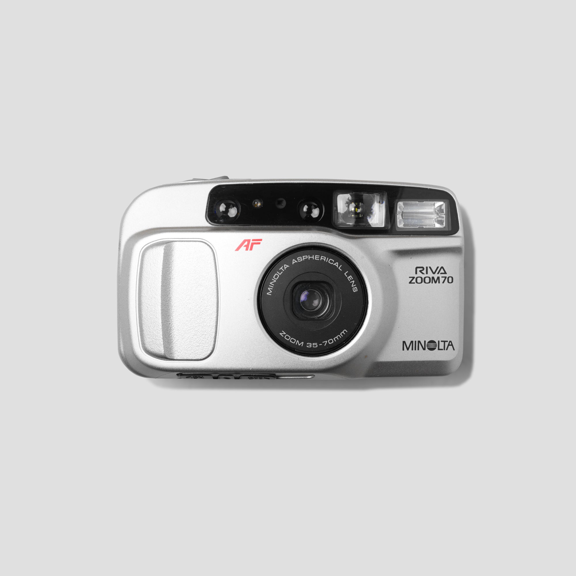 Minolta Riva Zoom 70 compact 35mm film camera from the front angle