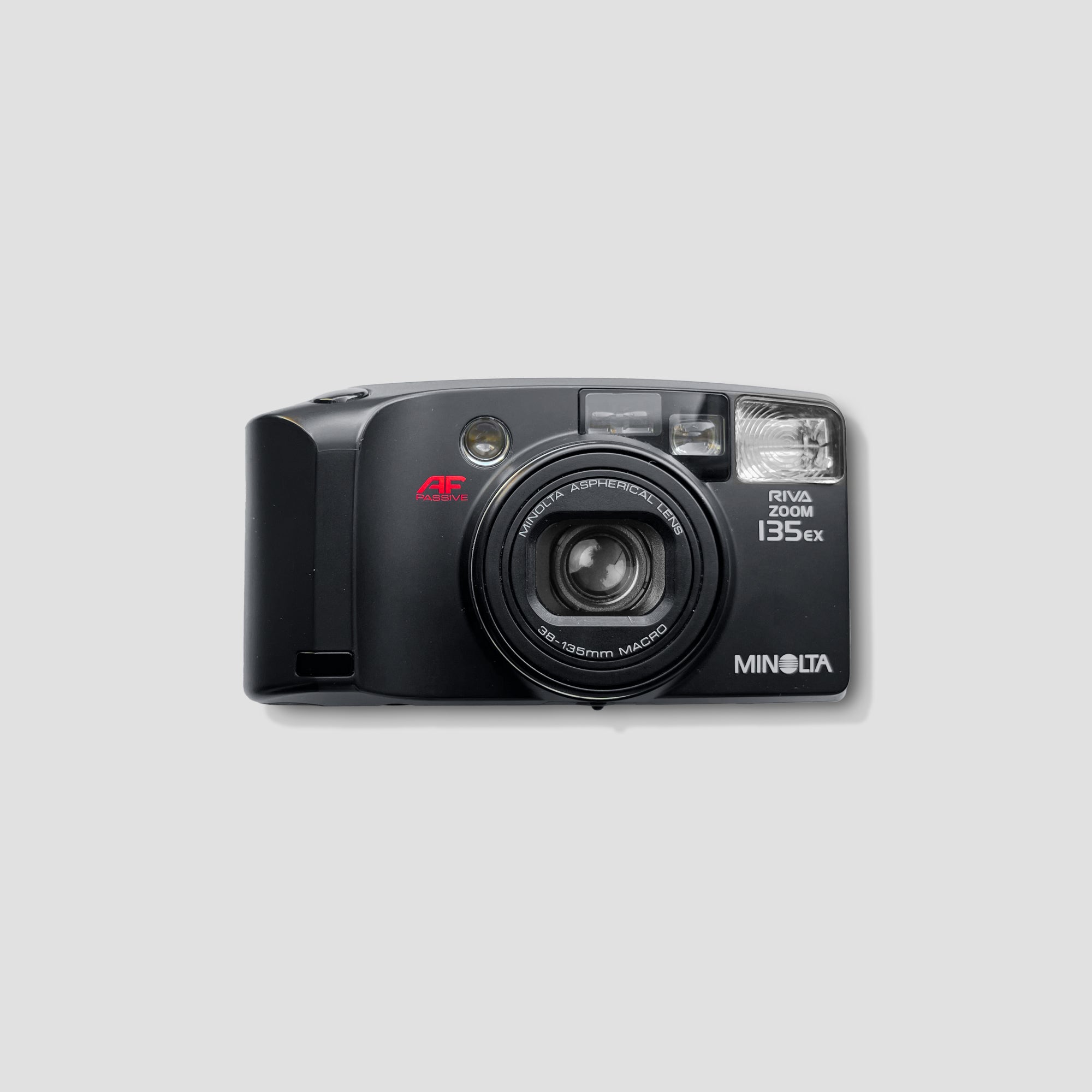 Front view of the Minolta Riva Zoom 135 EX showing its compact design and zoom lens