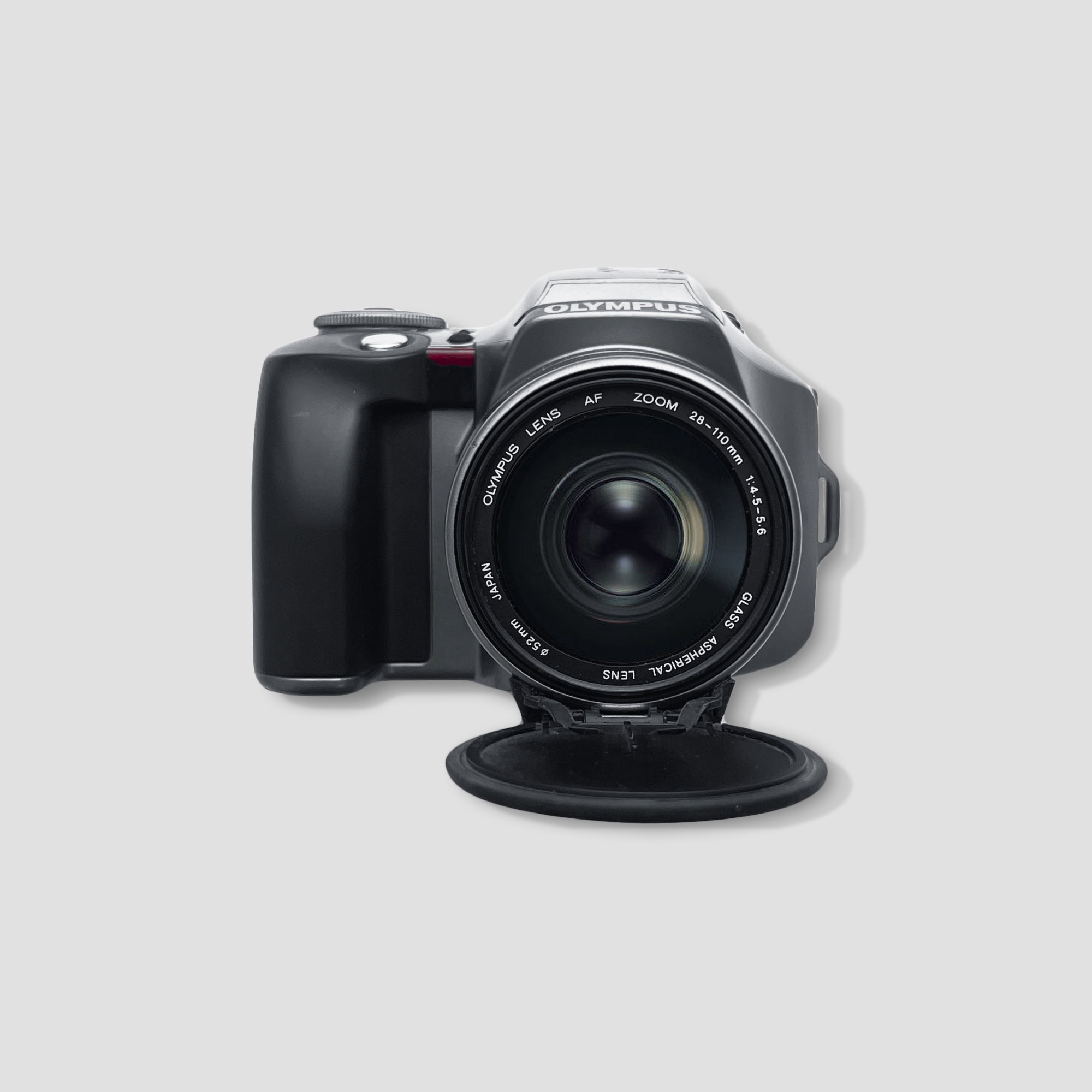 Olympus IS-300 bridge camera showing front view with zoom lens