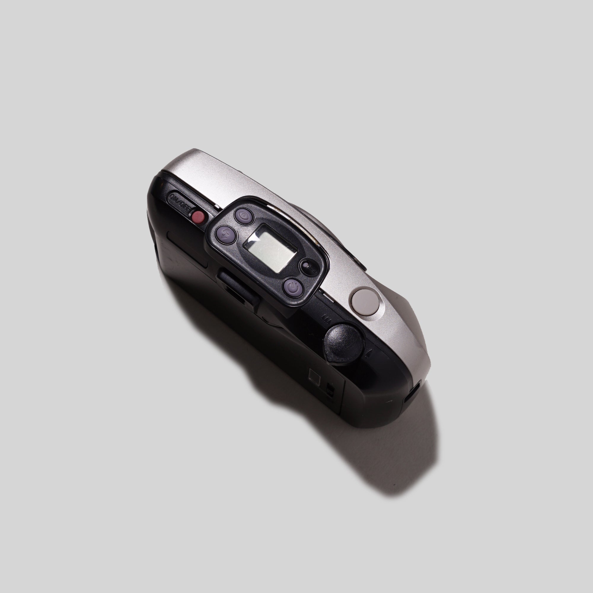 Close-up of the camera’s controls and lens, highlighting its beginner-friendly features