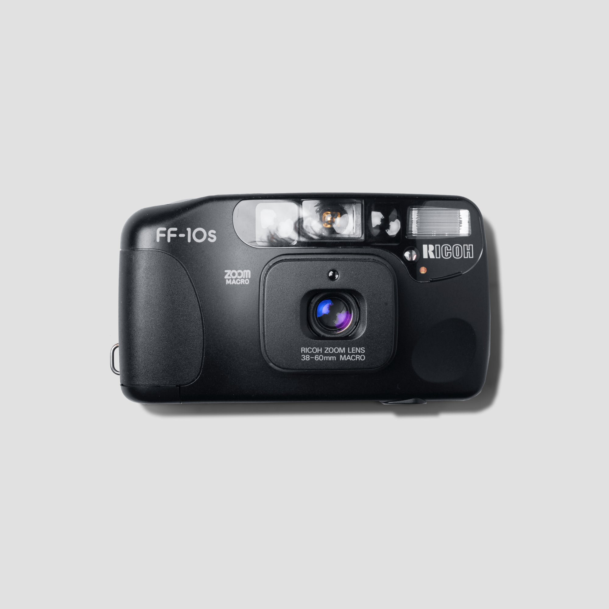 Ricoh FF-10s Zoom compact 35mm camera from front angle highlighting the zoom lens