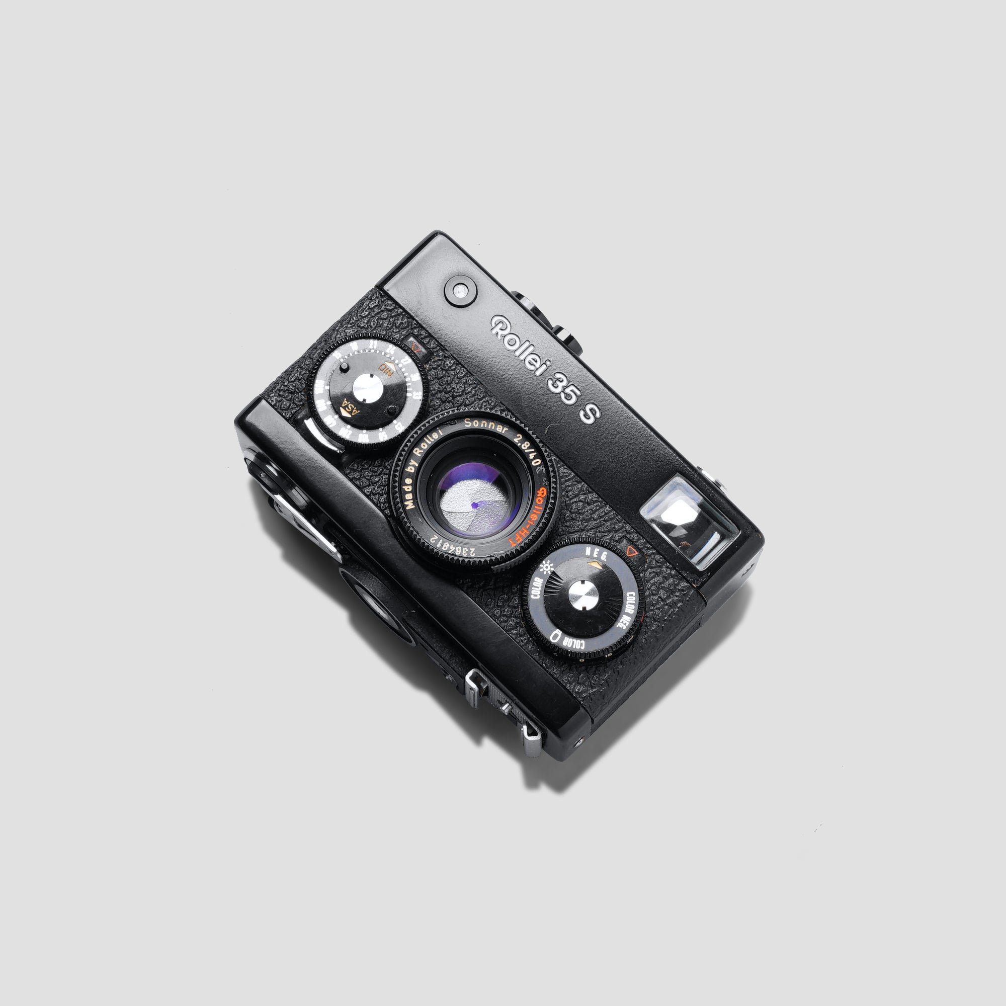 Close-up of the Rollei 35 S camera showcasing its compact size and manual controls