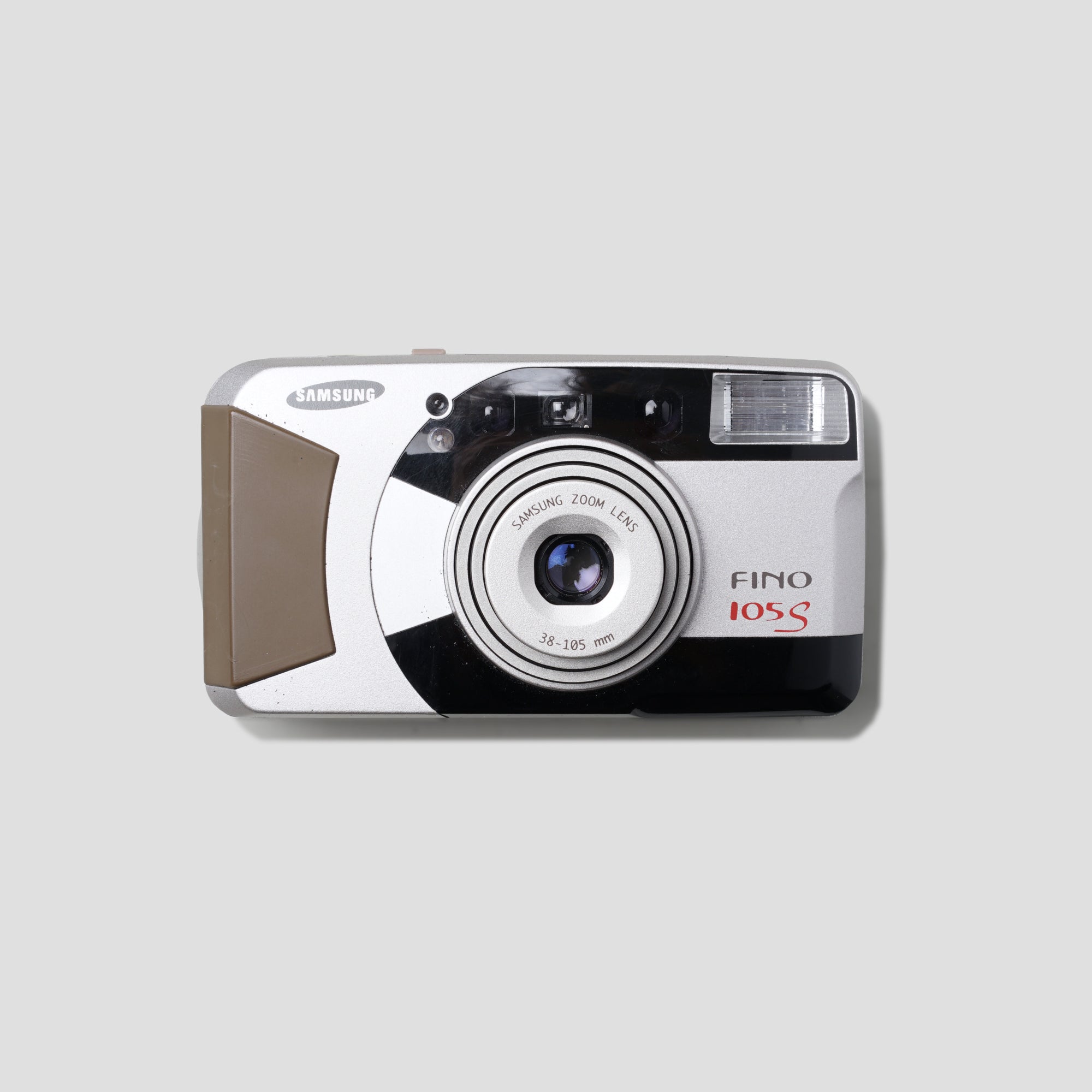 Close-up of Samsung Fino 105S point and shoot camera with zoom lens