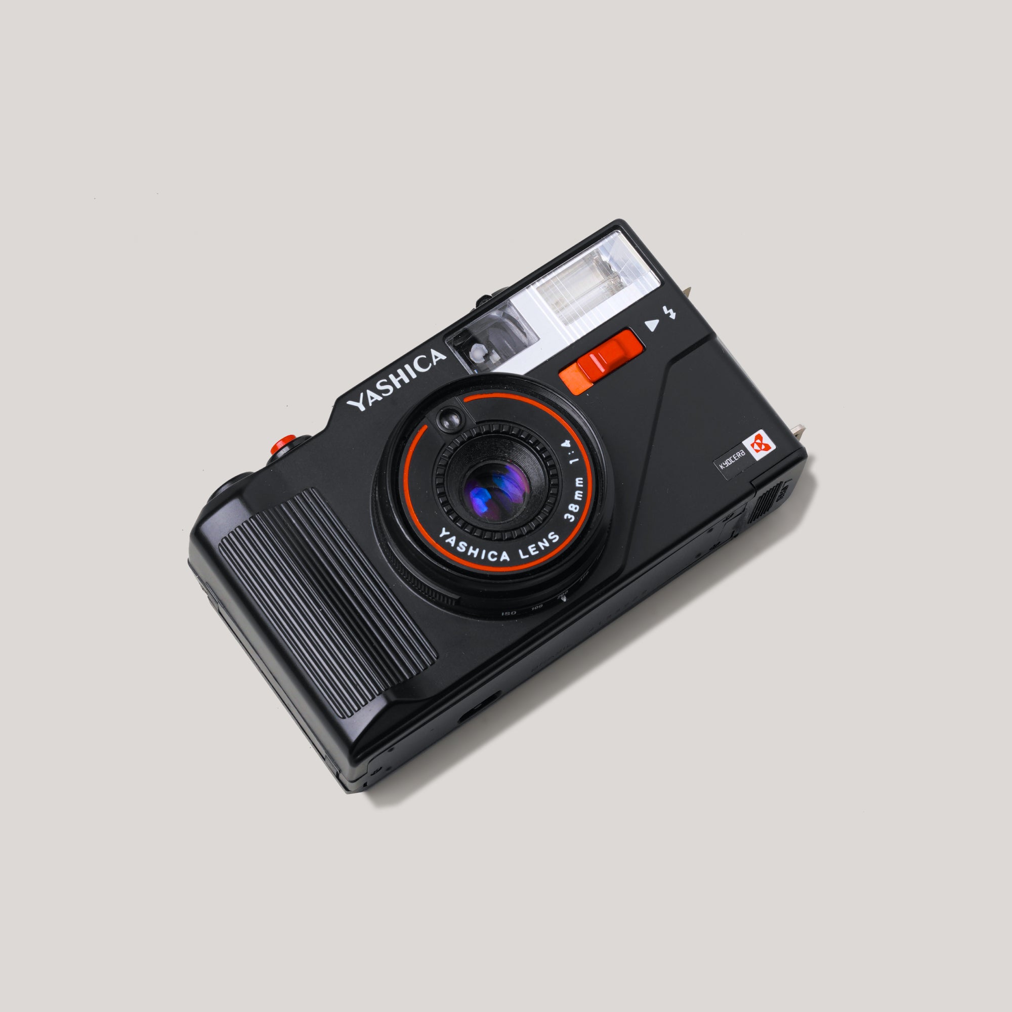 Yashica MF-3 vintage film camera close-up showing lens and manual dials